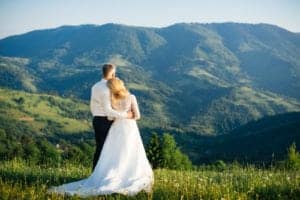 couple facing the Smoky Mountains